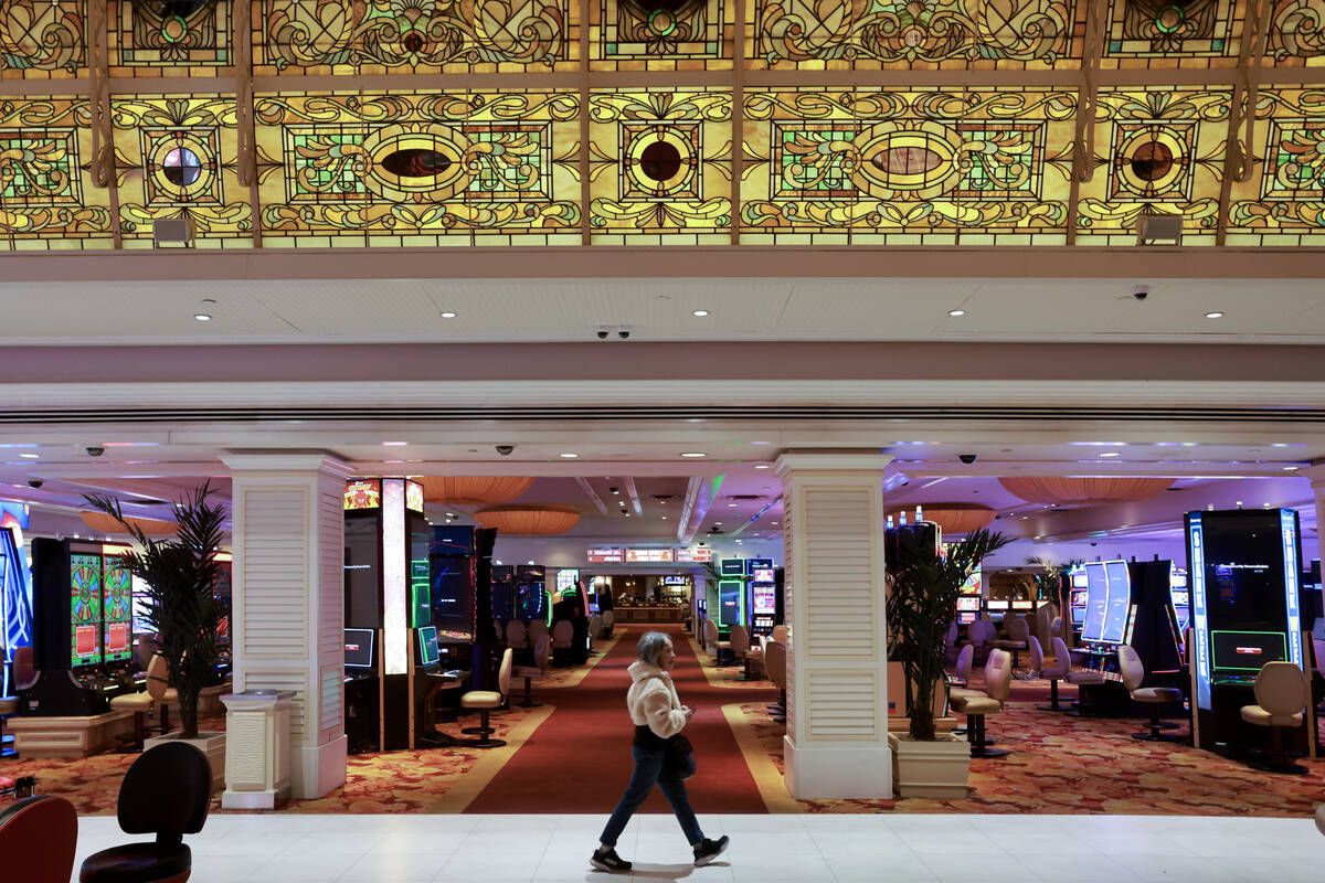 Nancy Kirk of Saratoga, Calif., walks under the famous stained-glass ceiling on the final day o ...