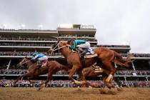 Mage, left, with Javier Castellano aboard, wins the 149th running of the Kentucky Derby horse r ...