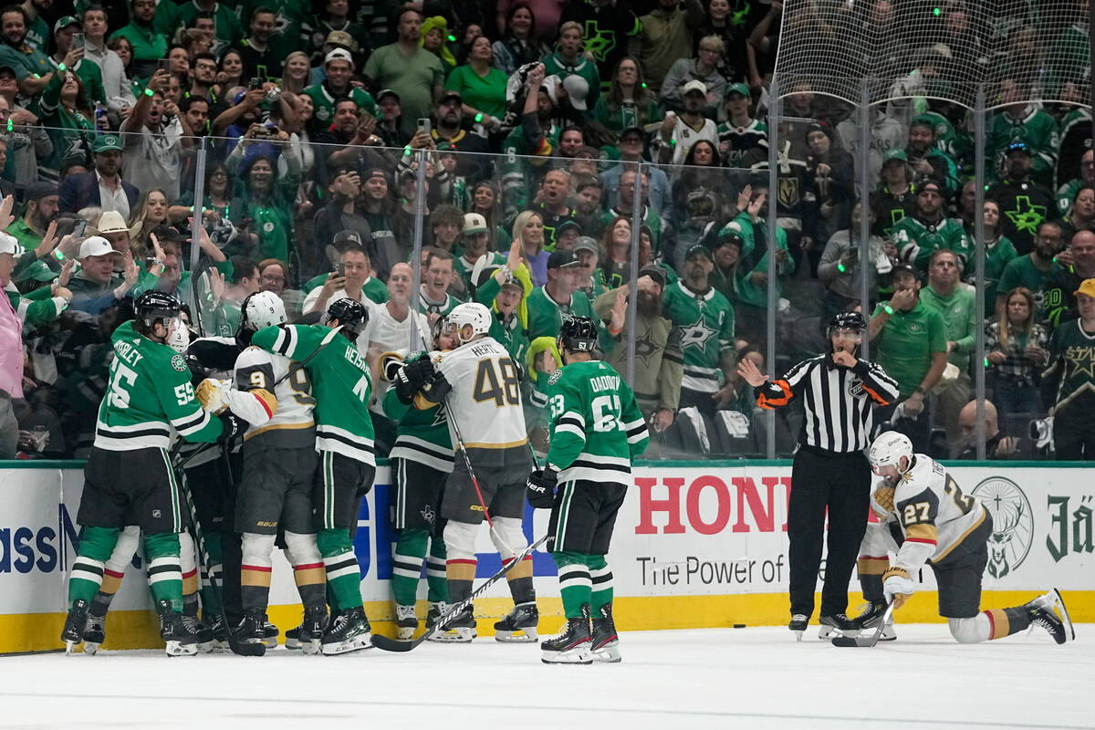 Fights break out between the Vegas Golden Knights and the Dallas Stars in the second period in ...