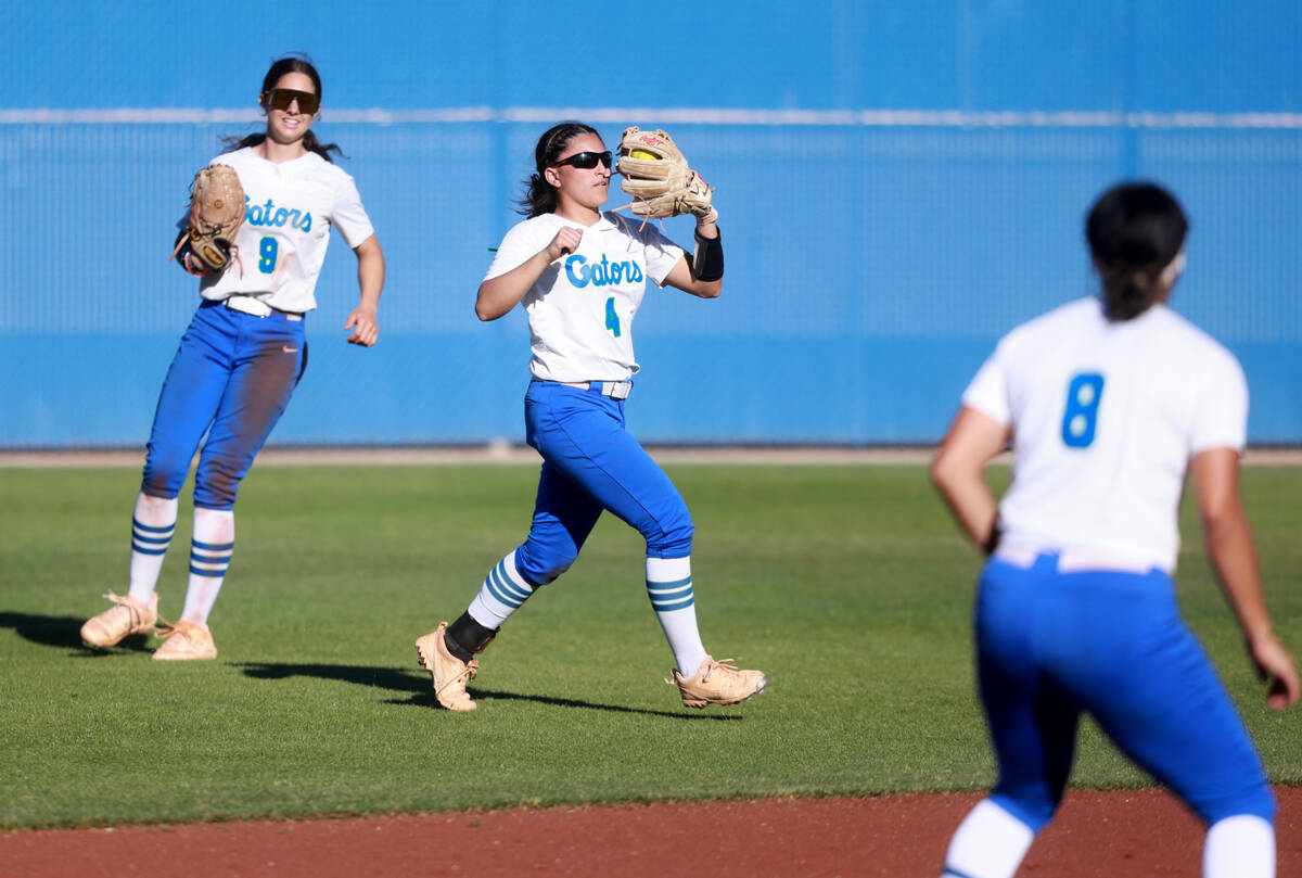 Green Valley center fielder Kalina Carrizales (4) brings in the ball against Bishop Gorman in ...