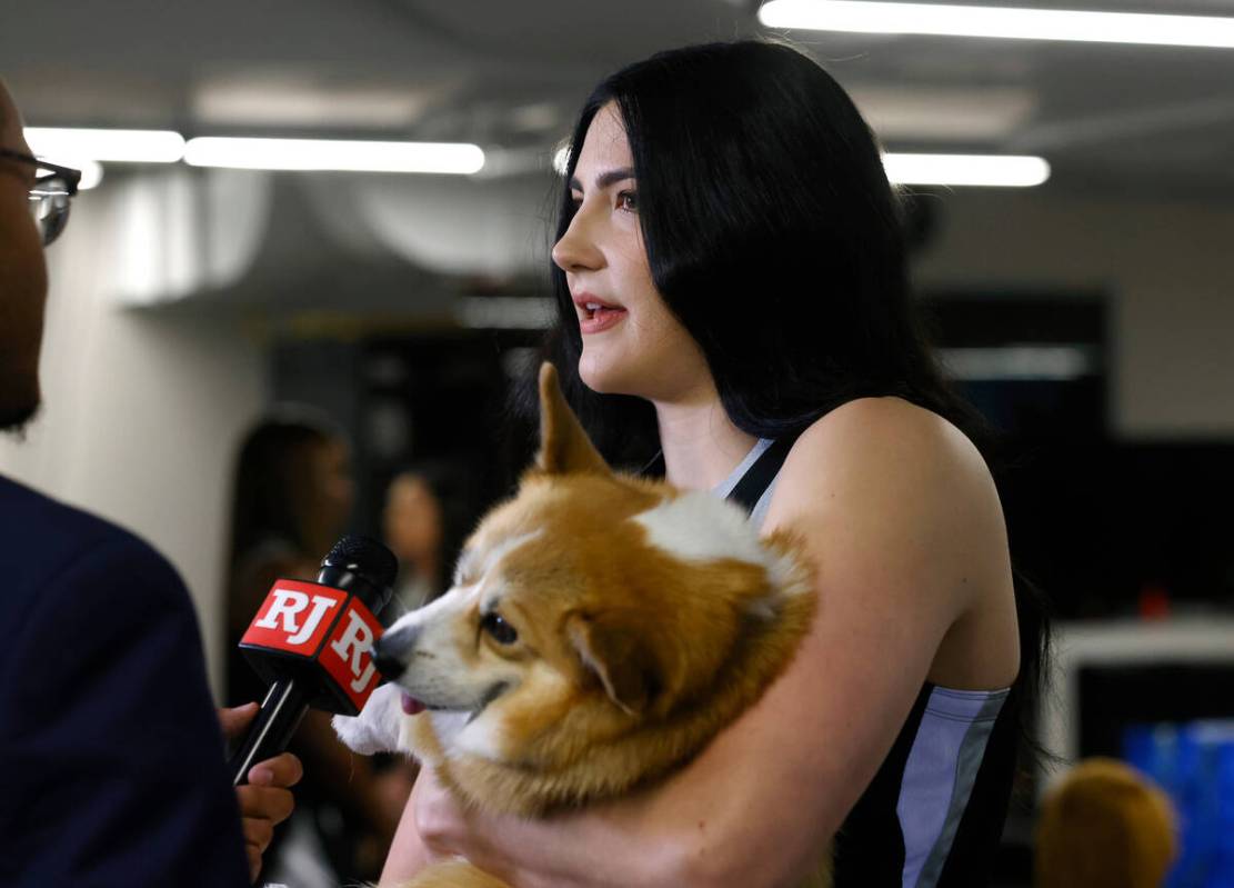 Las Vegas Aces center Megan Gustafson (17) holding her dog Pancake speaks during an interview w ...