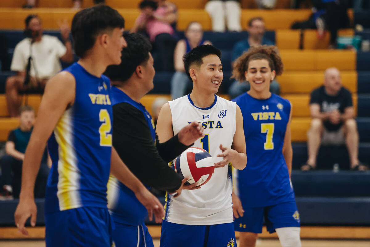 Sierra Vista teammates celebrate during a boys volleyball game between Centennial and Sierra Vi ...