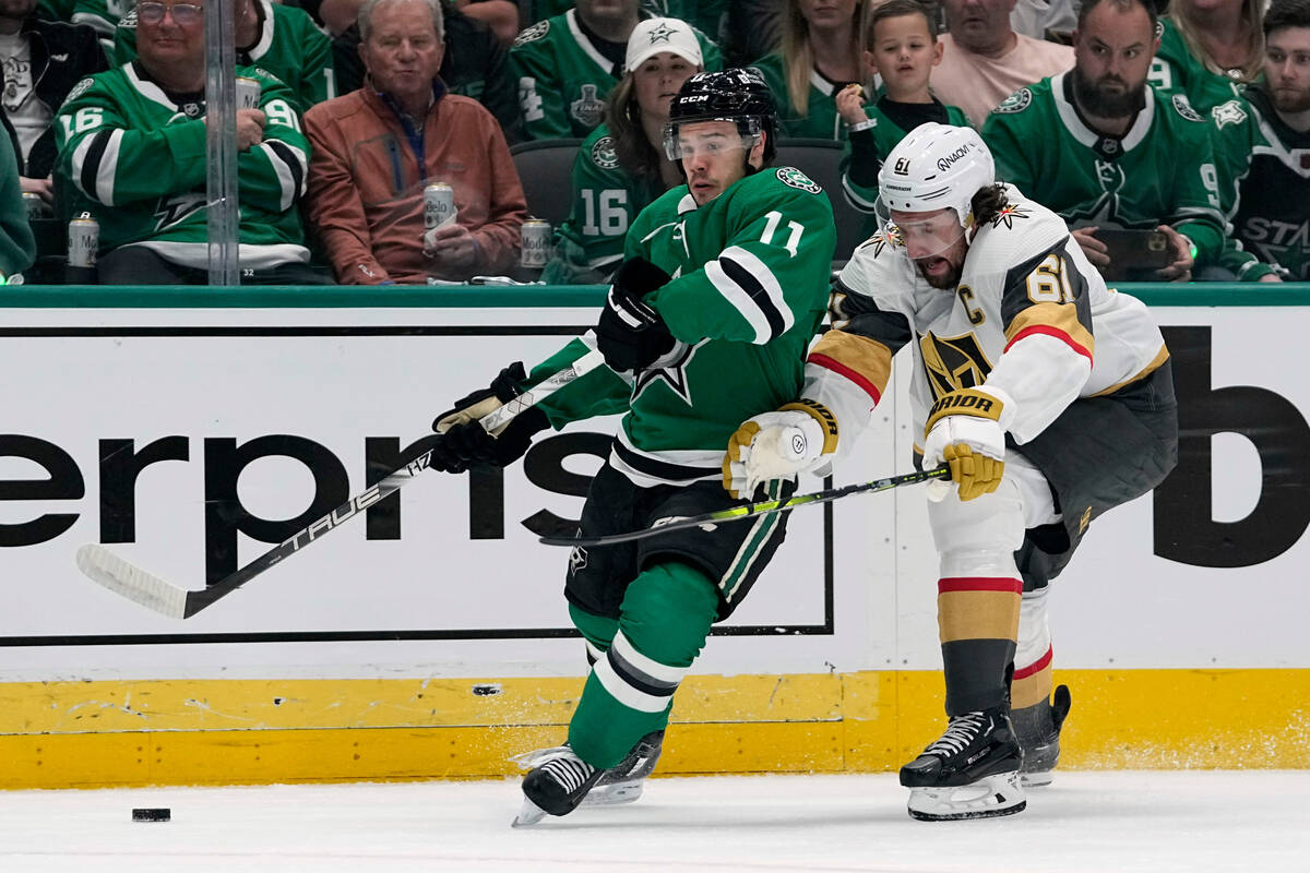 Dallas Stars center Logan Stankoven (11) gets past Vegas Golden Knights right wing Mark Stone ( ...