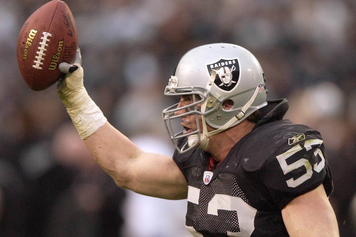 Oakland Raiders' Bill Romanowski celebrates his fourth-quarter fumble recovery against the New ...