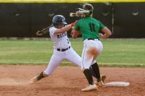 Shadow Ridge High School’s Carmella Garganese (2) reaches to make it safe to second base ...