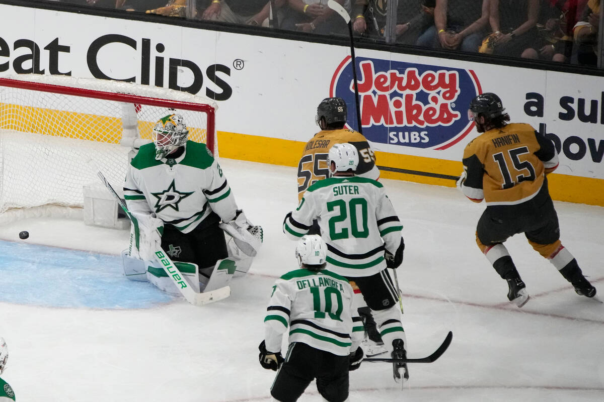 Vegas Golden Knights defenseman Noah Hanifin (15) scores on Dallas Stars goaltender Jake Oettin ...