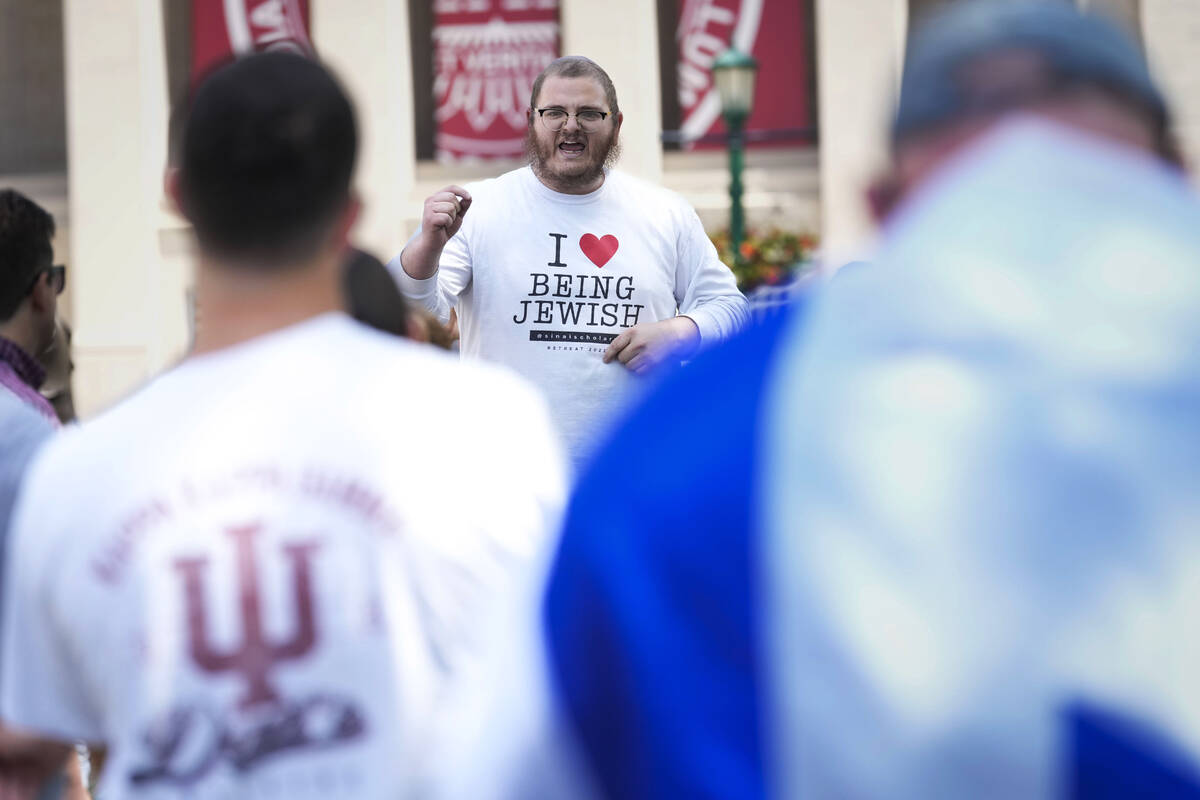 Rabbi Levi Cunin, with Chabad on Campus, speaks during a pro-Israel rally at Indiana University ...