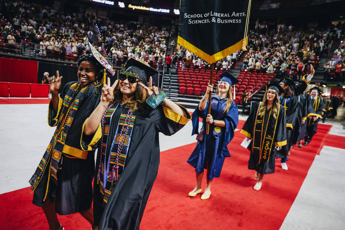 Graduates participate in the Nevada State University commencement ceremony at the Thomas & ...