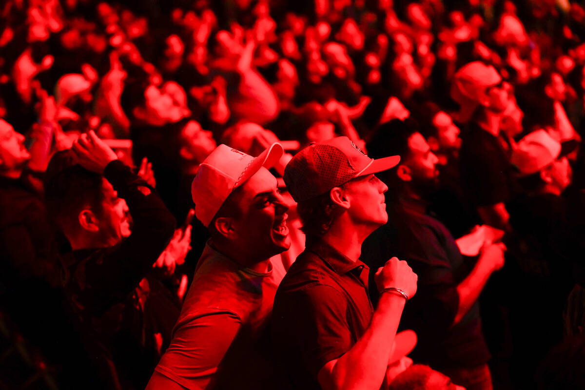 Fans cheer after Canelo Álvarez got a hit on Jaime Munguía during an undisputed world ...