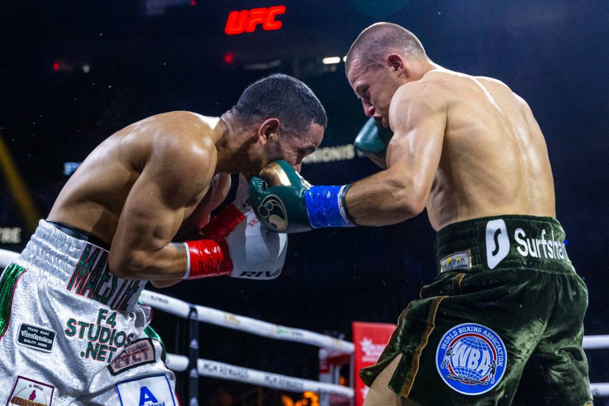 Wewlterweight Gabriel Maestre, left, takes a punch to the chin by Eimantas Stanionis during the ...