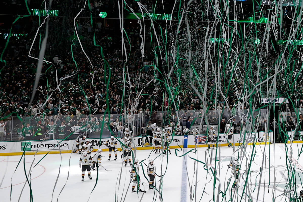 Streamers drop as Vegas Golden Knights players look on after the Dallas Stars defeated the them ...