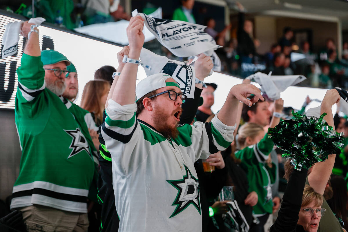 Spectators react during the third period in Game 7 of an NHL hockey Stanley Cup first-round pla ...