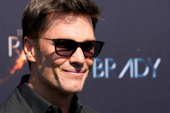 Tom Brady poses at "The Greatest Roast of All Time: Tom Brady" at the Kia Forum, Sund ...