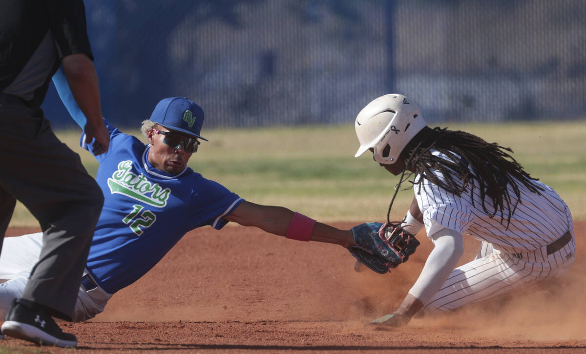 Shadow Ridge's Christian Wilkes (30) steals second base against Green Valley's infielder Caden ...