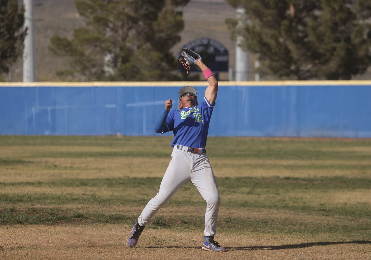 Green Valley's infielder Caden Kirby (12) catches a fly ball from Shadow Ridge during a high sc ...