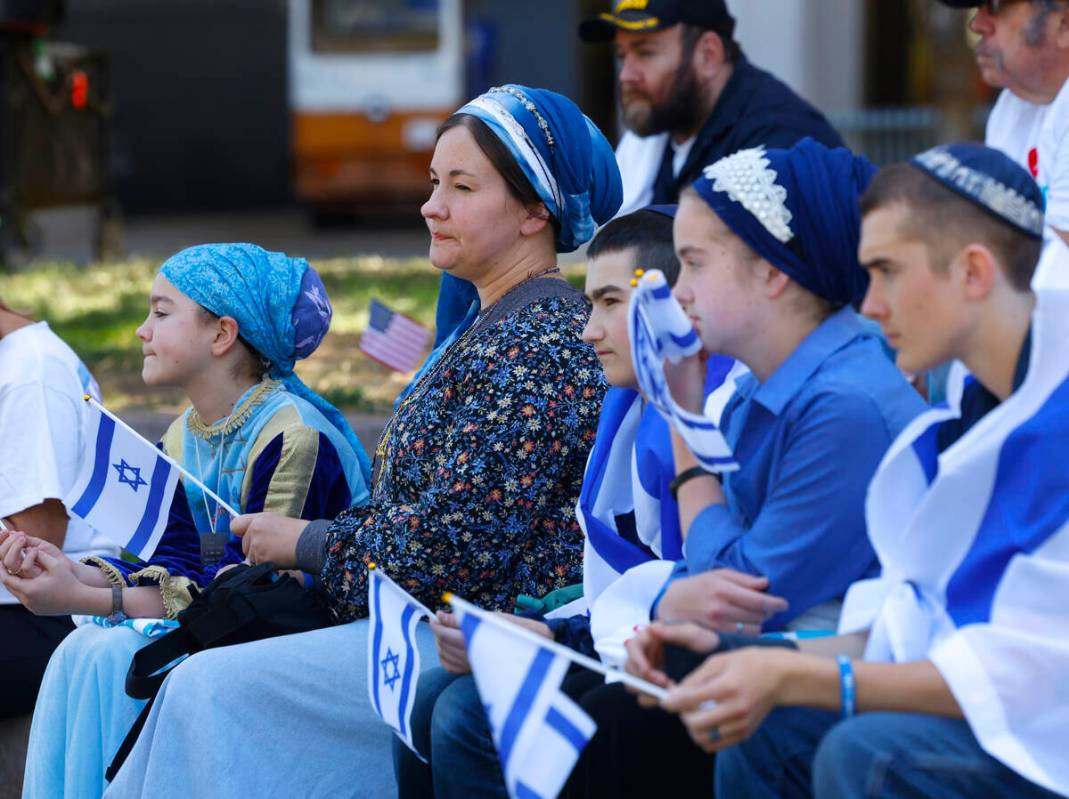 Lydia Netan, second left, attends Stand Against Hate Rally, supporting Jewish college students, ...