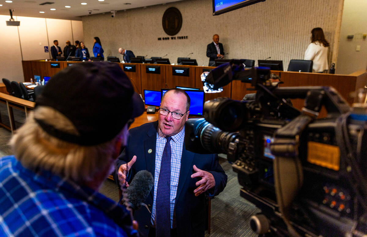 Mayor John Stephens speaks with a media member as the City of Costa Mesa discusses whether to s ...