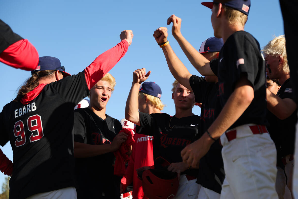 Liberty celebrates after eliminating Las Vegas during a Class 5A high school baseball Southern ...