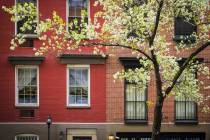 Apartment buildings in New York City. Rental housing costs have outpaced salaries in all but si ...