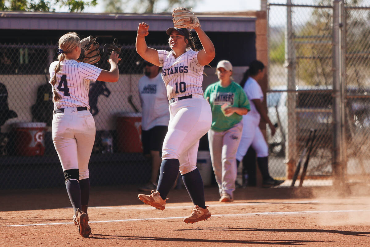 Shadow Ridge players celebrate after an inning during a Class 5A Southern Region high school so ...