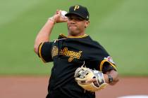 Pittsburgh Steelers quarterback Russell Wilson throws a ceremonial first pitch before a basebal ...