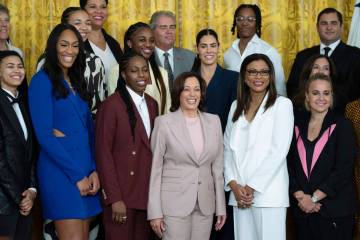 Vice President Kamala Harris, center, poses with Las Vegas Aces' A'ja Wilson, from left, Chelse ...