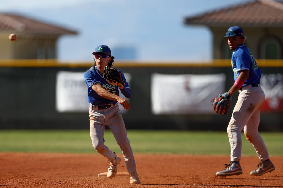 Green Valley shortstop Jacob Ferry (3) throws to first base for a double play over Coronado dur ...