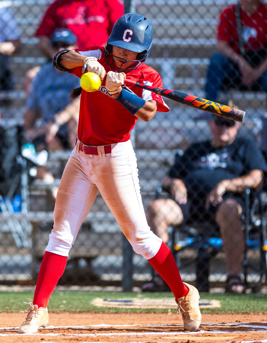 Coronado batter Alohi Mundon (8) connects on a Shadow Ridge pitch during the first inning of th ...