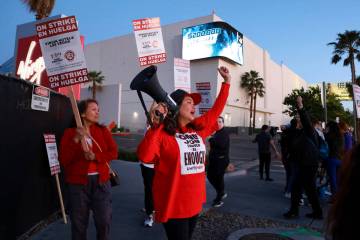 Culinary Local 226 members picket at the start of a 48 hour strike at Virgin Hotels in Las Vega ...