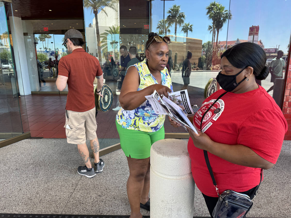 Culinary Local 226 members hand out union fliers during a 48 hour strike at Virgin Hotels in La ...