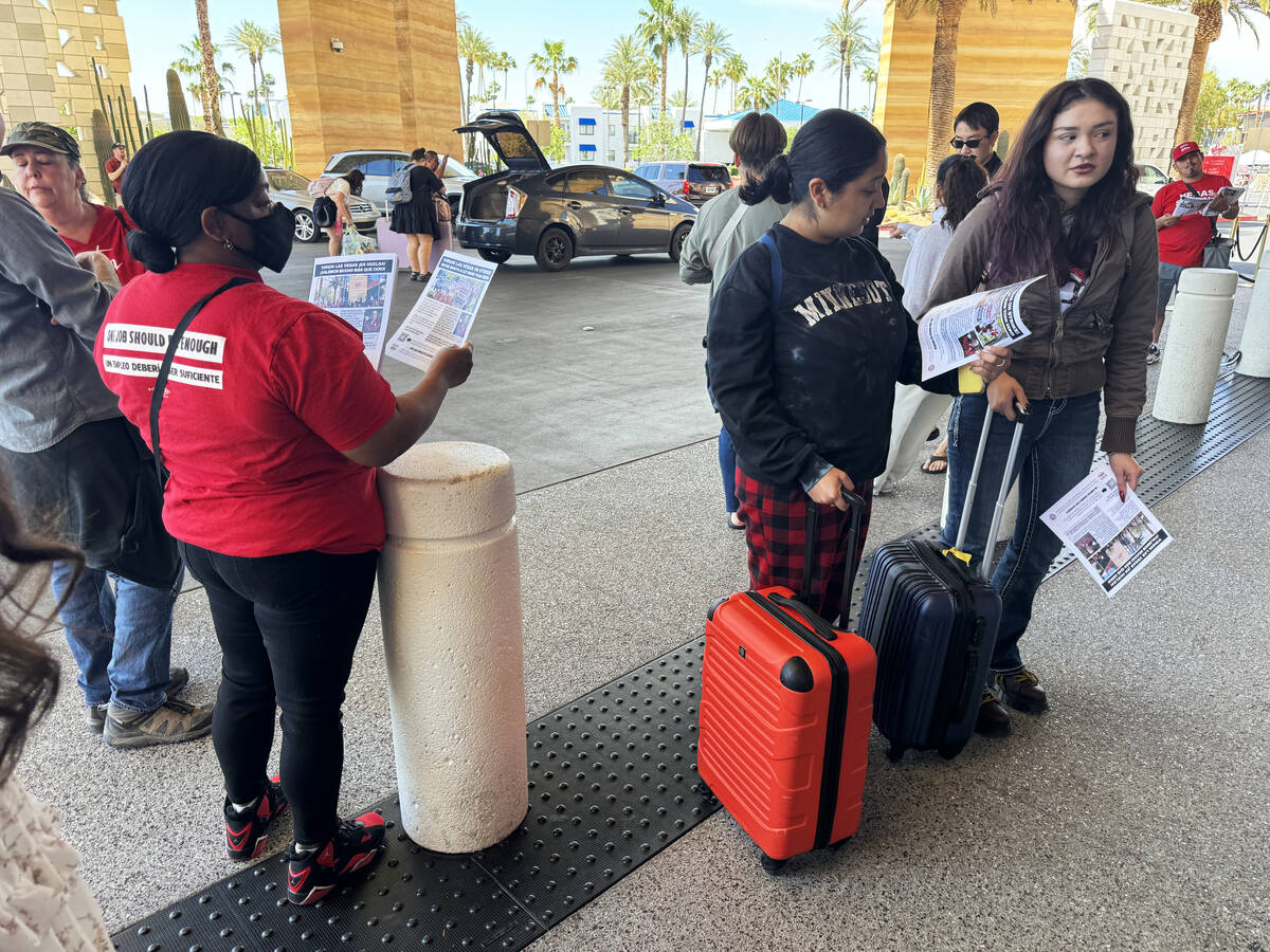 Culinary Local 226 members hand out union fliers during a 48 hour strike at Virgin Hotels in La ...