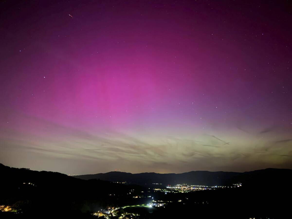 Northern lights appear over the Dreisamtal valley in the Black Forest near Freiburg, Germany, F ...