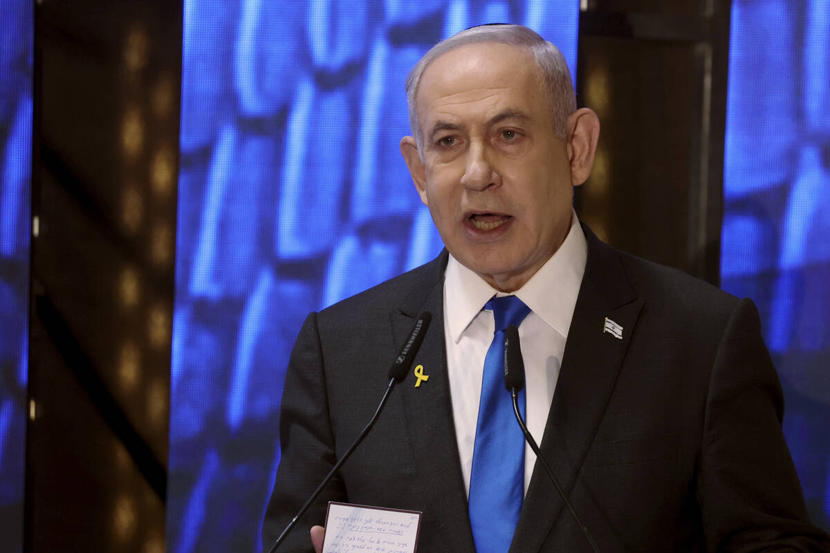 Israeli Prime Minister Benjamin Netanyahu addresses a ceremony marking Memorial Day for fallen ...