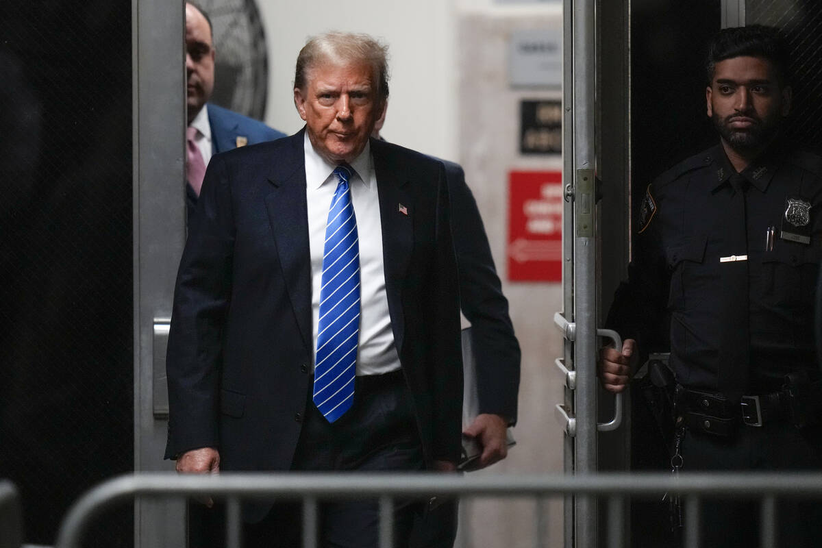 Former President Donald Trump returns to the courtroom after a break at Manhattan criminal cour ...