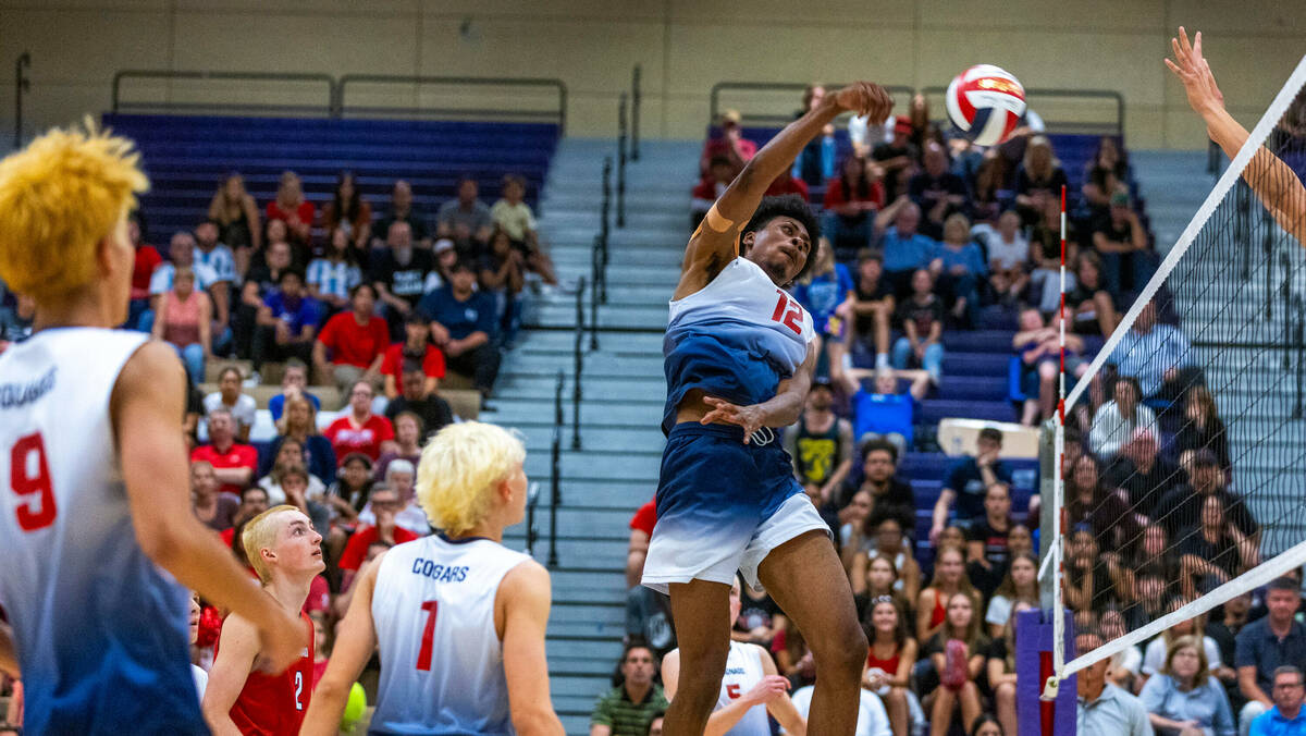 Coronado's Jayden Bell (12) spikes the ball against Palo Verde during the Class 5A boy's volley ...