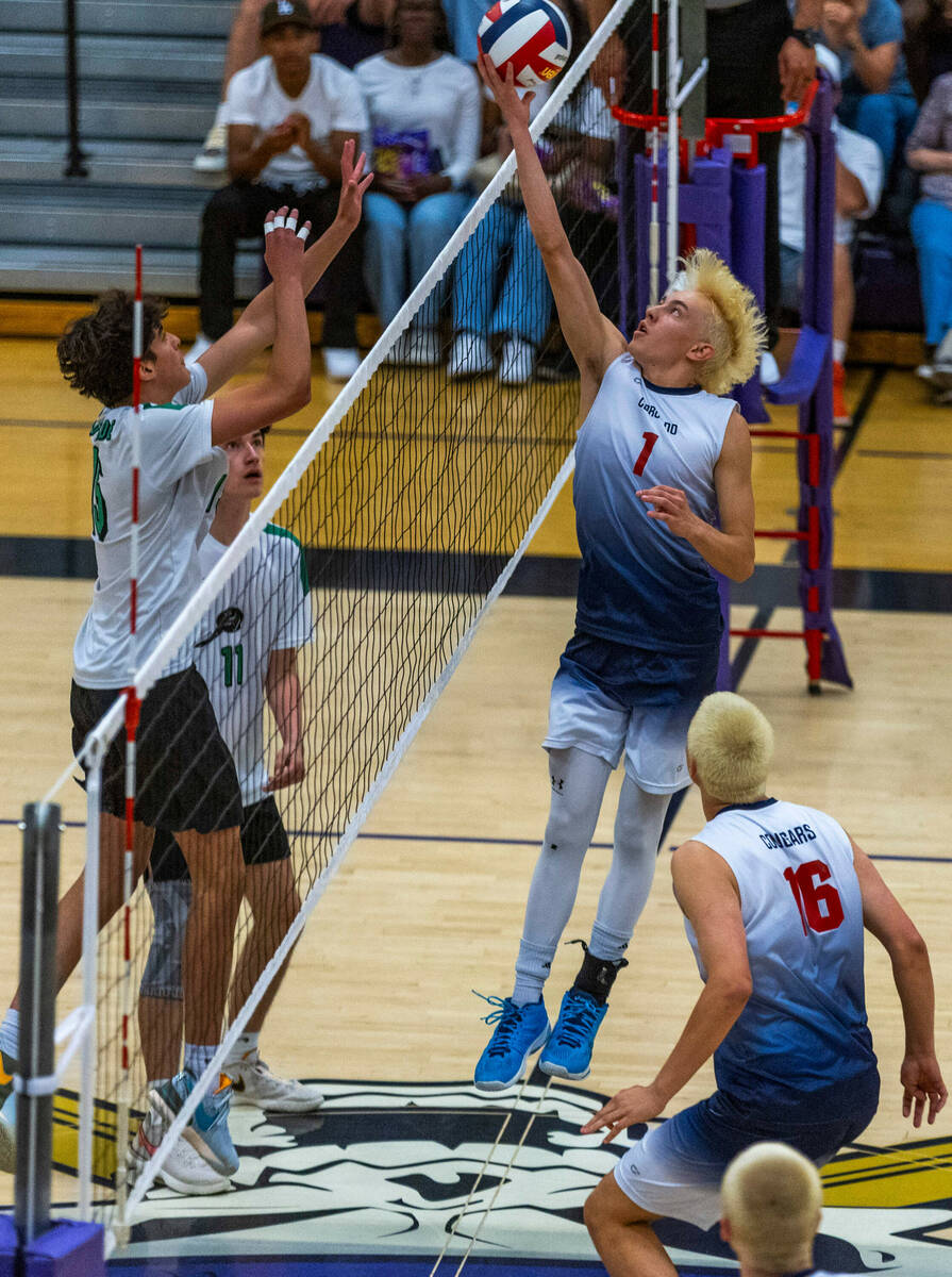 Coronado's Braxton Rowley (1) dinks the ball over the net against Palo Verde's Davide Bruce dur ...