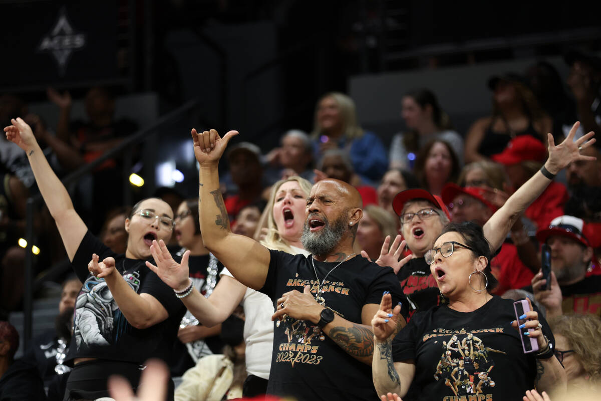Las Vegas Aces fans sing “We Are The Champions” during the first half of a WNBA b ...