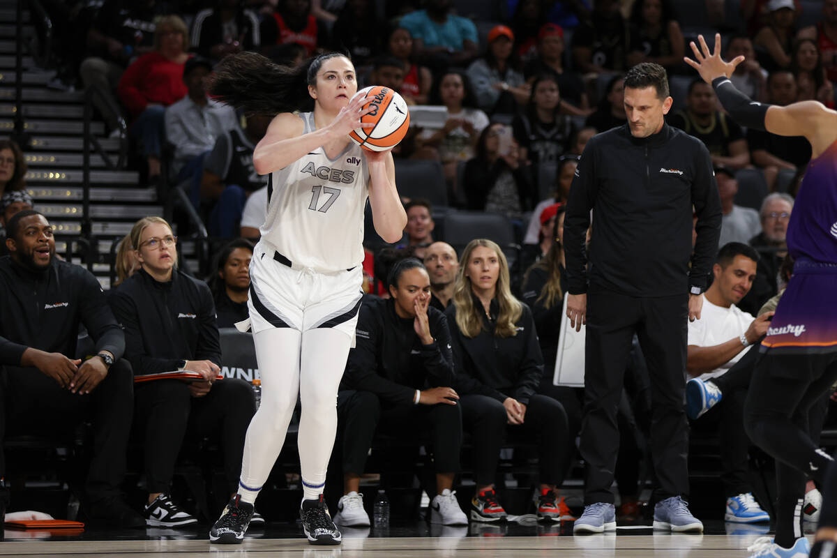 Las Vegas Aces center Megan Gustafson (17) bends to shoot during the second half of a WNBA bask ...