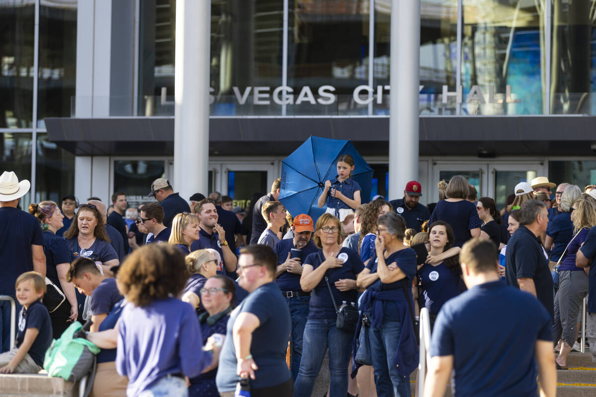 Supporters of a proposed new Church of Jesus Christ of Latter-day Saints temple gather outside ...