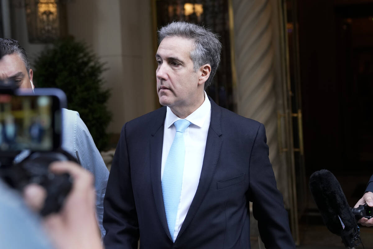 Michael Cohen leaves his apartment building in New York, Tuesday, May 14, 2024. Cohen, former P ...