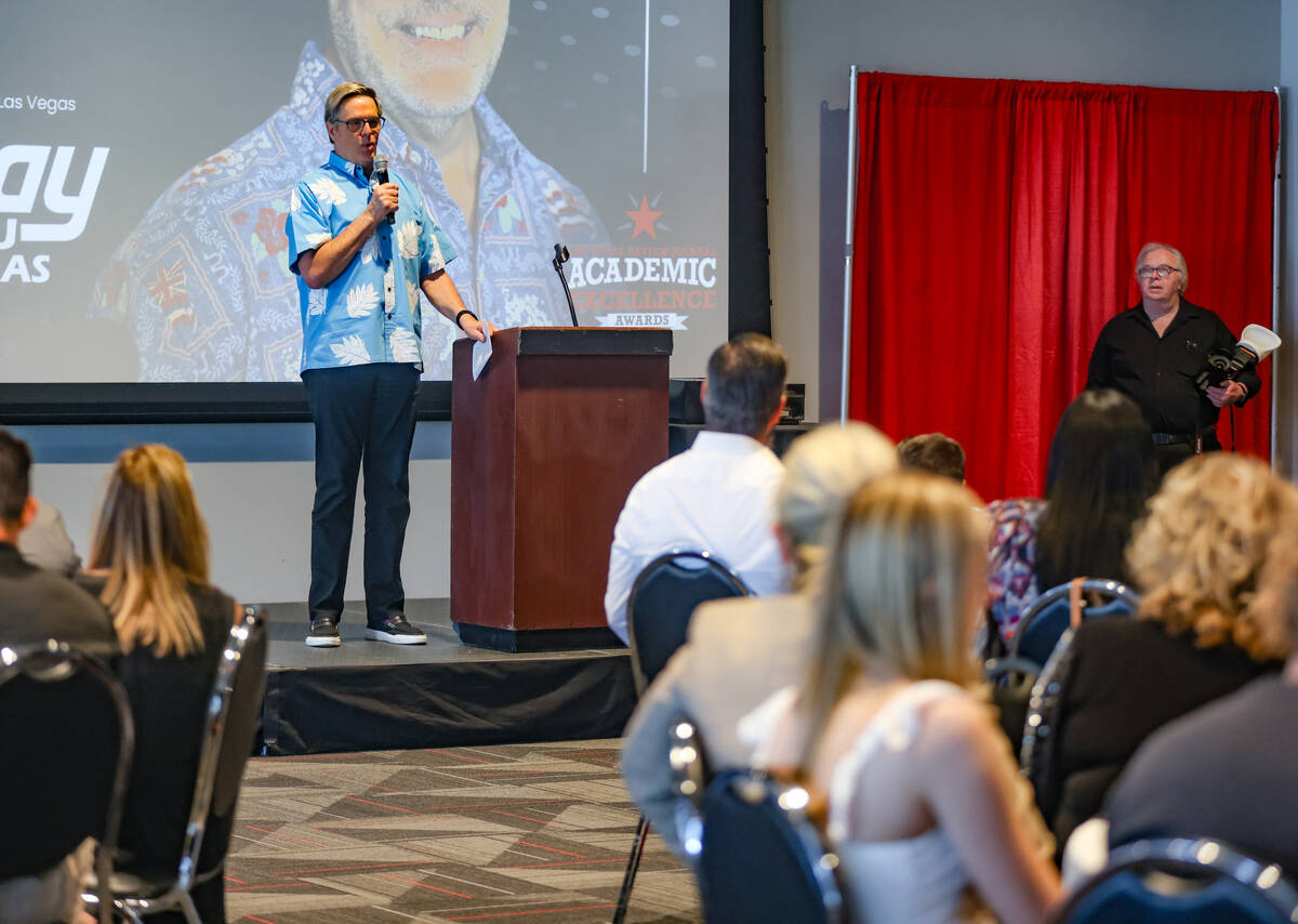 Burton Hughes, general manager of Suburu Las Vegas, addresses the audience at the Las Vegas Rev ...