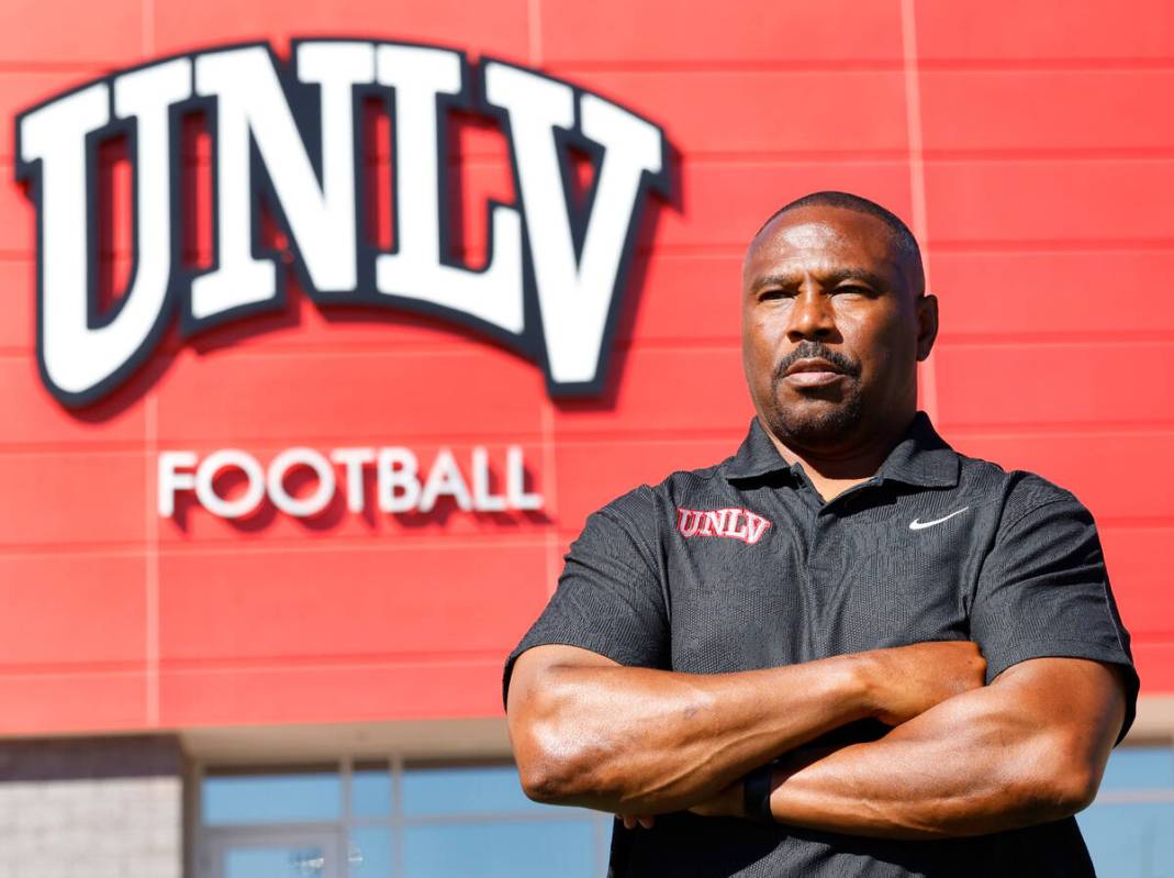Former Rebel Hunkie Cooper, now a member of the staff, poses for a photo at Fertitta Football C ...