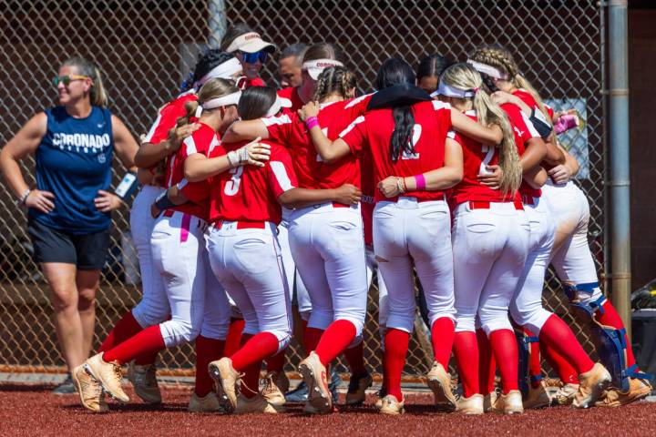 Coronado players get pumped up to face Palo Verde during the their 5A softball state tournament ...