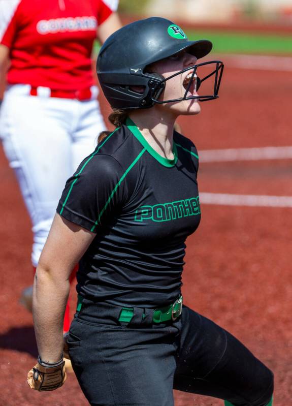Palo Verde runner Mya Bartlett (18) celebrates a successful slide into third base against Coron ...