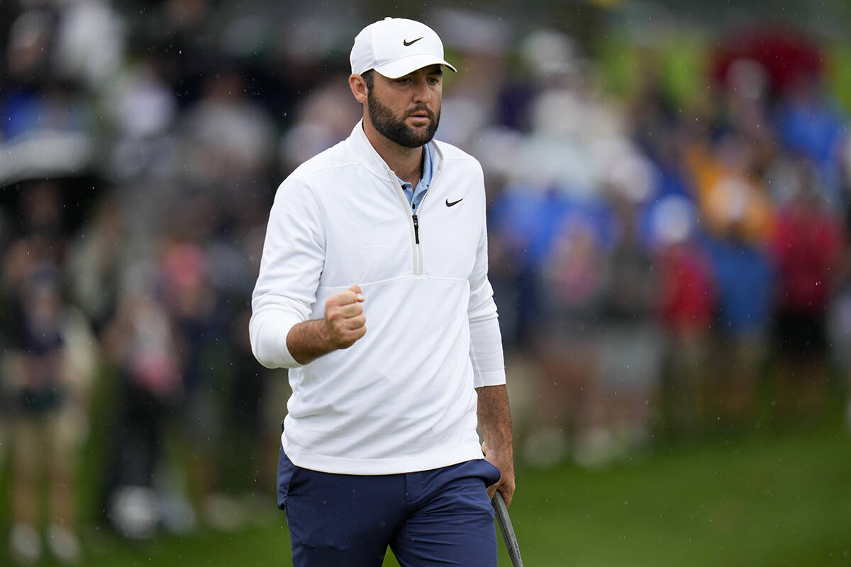 Scottie Scheffler celebrates after a birdie on the 12th hole during the second round of the PGA ...