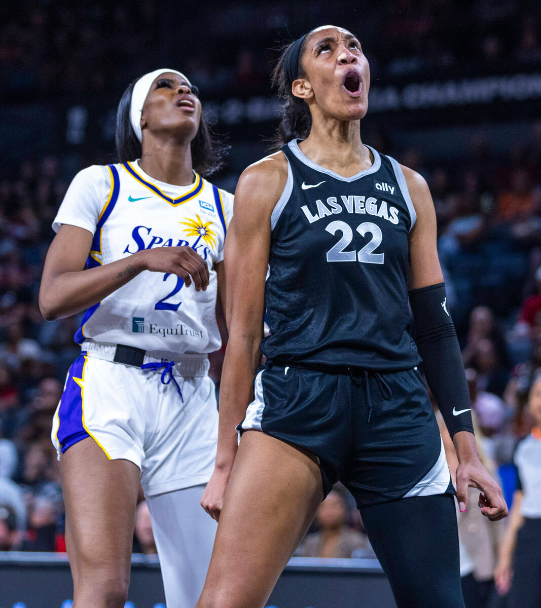 Aces center A'ja Wilson (22) is pumped about a score and foul against Los Angeles Sparks forwar ...