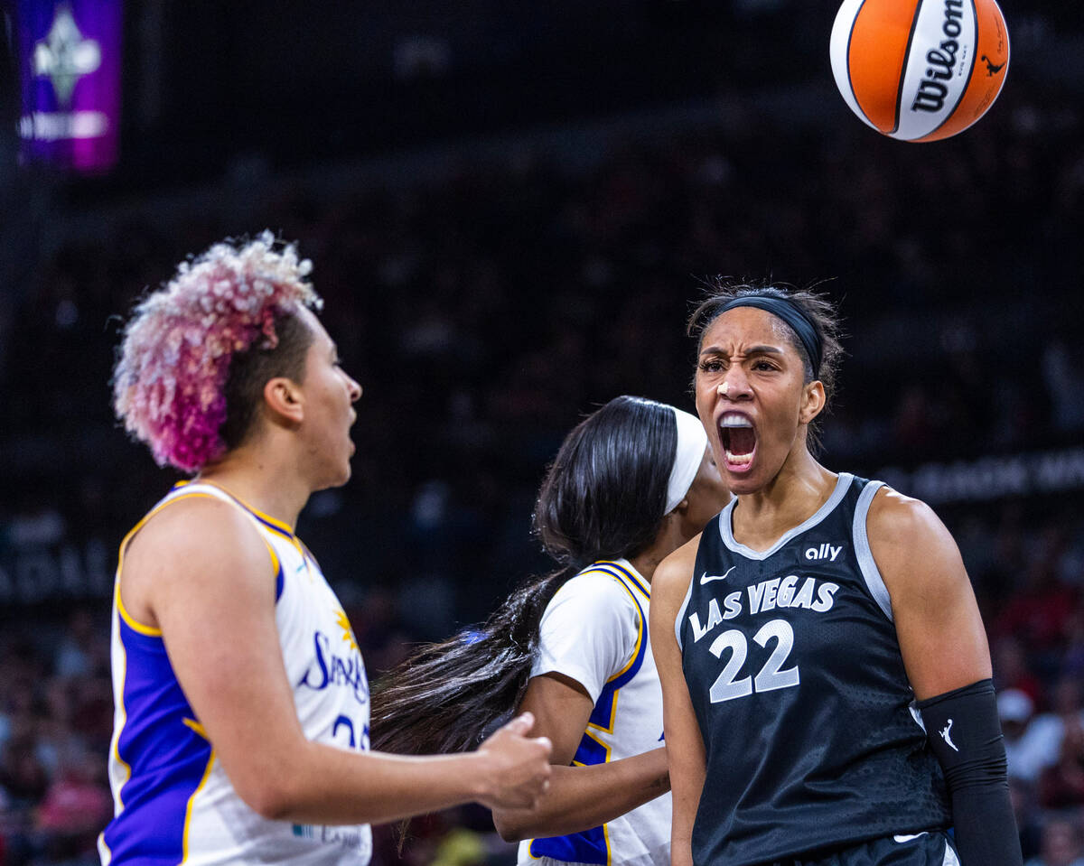 Aces center A'ja Wilson (22) is pumped about a score and foul with a yell near Los Angeles Spar ...