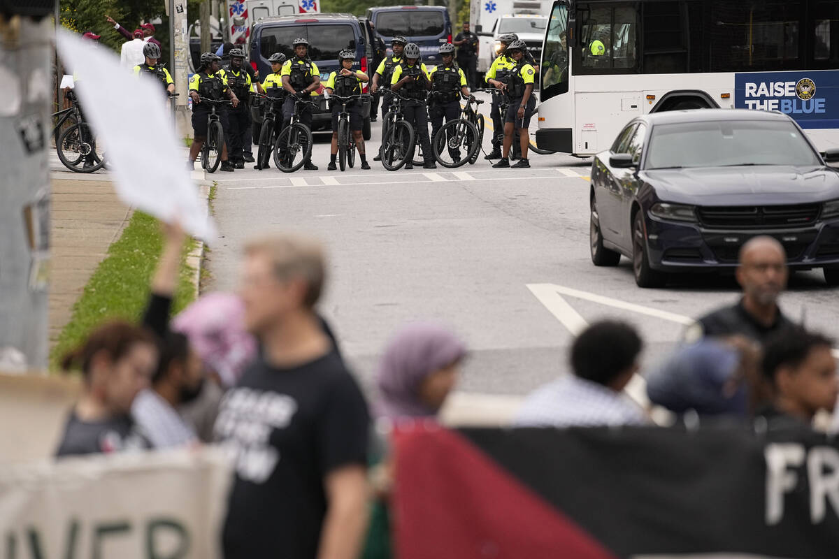 Pro-Palestinian supporters protest with police presence near the commencement at Morehouse Coll ...