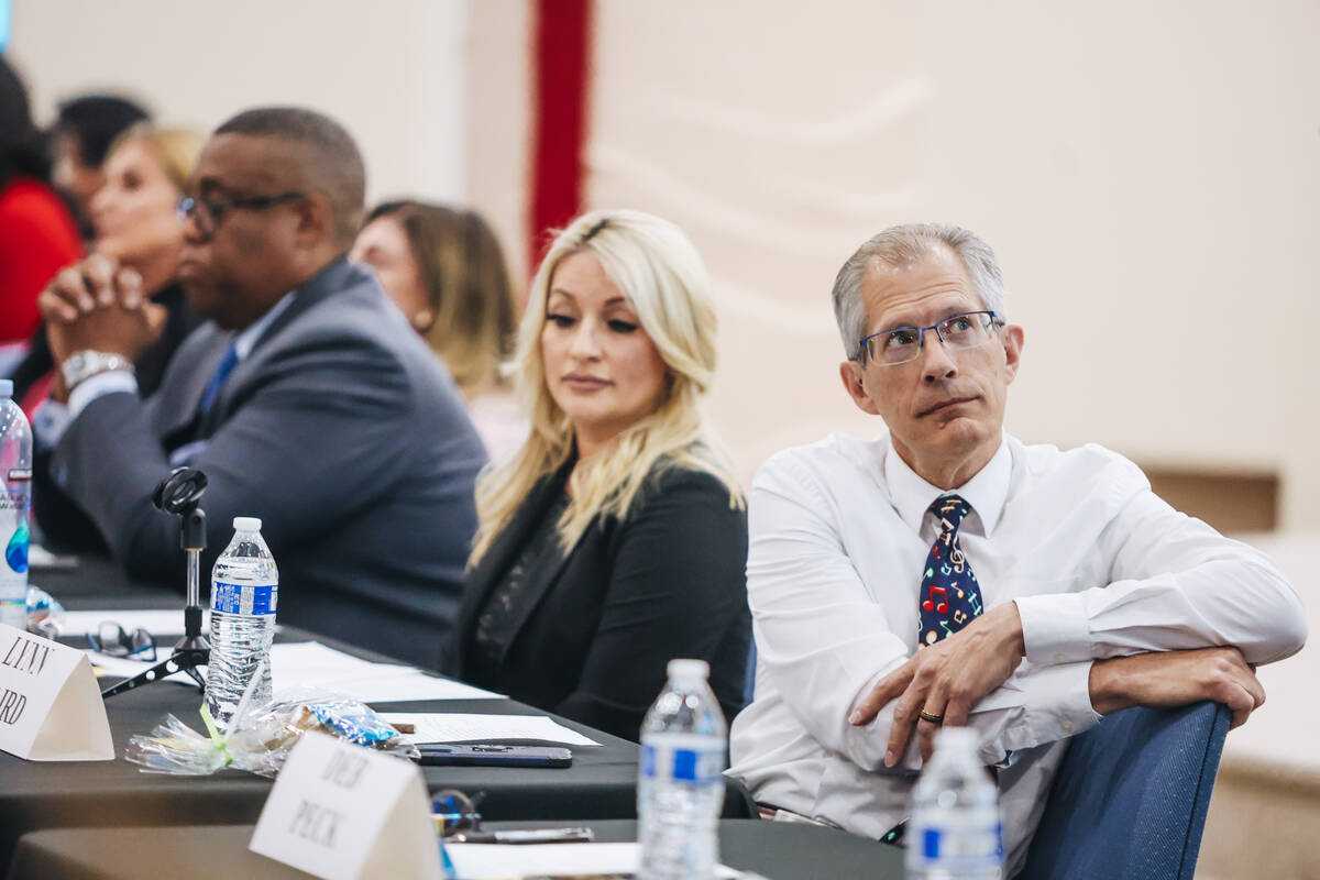 Lynn Baird listens to fellow mayoral candidate Deb Peck (out of frame) speak during a forum for ...