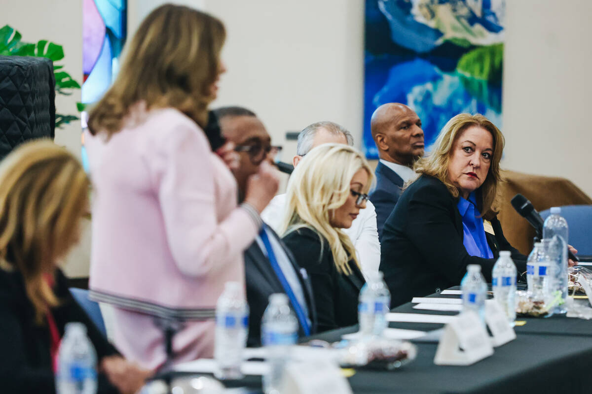 Deb Peck, a candidate for mayor of Las Vegas, listens to fellow candidate Shelley Berkley speak ...